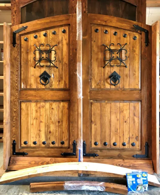 Rustic reclaimed lumber arched door solid wood story book castle winery hardware