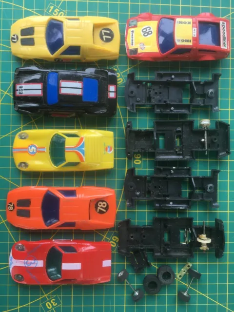 Six 1/43 scale Playit/Artin slot car & similar car bodies, 4 chassis and spares