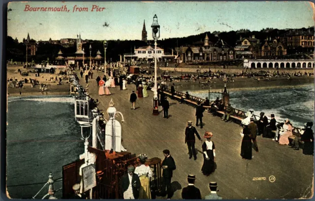 Bournemouth From Pier postcard antique colour printed figures seaside
