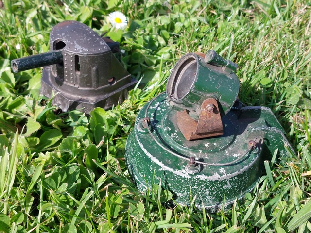 An Astra anti-tank gun, a round base searchlight and a 12 Howitzer