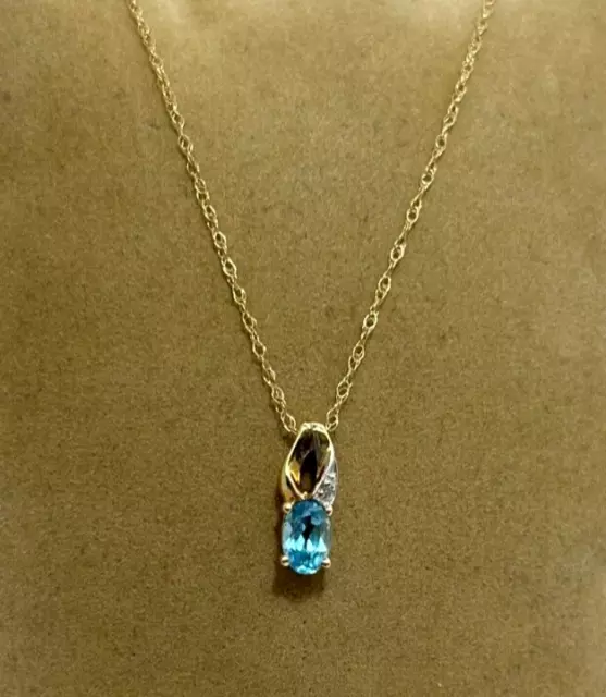 CHARMING 10k YELLOW GOLD 18" CHAIN & BLUE TOPAZ & DIAMOND ACCENT PENDANT