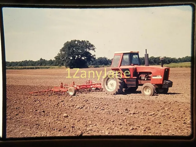 AC0415 35mm Slide of an ALLIS CHALMERS MEDIA 1200 Field Cultivator AC7030 tracto