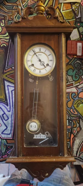 Guzzini Orologio da parete con pendolo fotosensibile