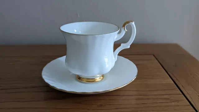 Royal Albert Val D'or white bone china coffee cup and saucer with gold trim