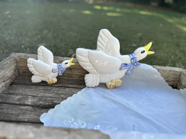 Pair Vintage retro 1980s Flying Wall Ducks Ceramic- White with Blue Ribbon Bow