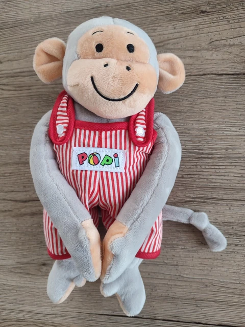 Peluche doudou singe popi 25cm gris salopette rouge comme neuf