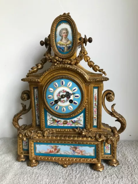 ANTIQUE FRENCH  Figural Ormolu MANTEL CLOCK with beautiful porcelain panels.