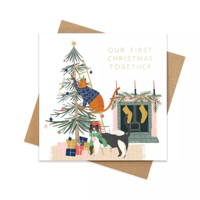 First Christmas together card illustrated cats decorating a tree by the fire