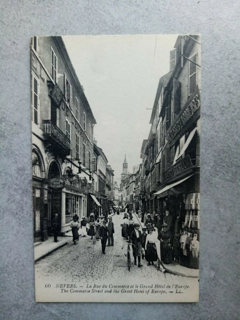 Cpa Nevers La Rue Du Commerce Et Grand Hôtel De L Europe