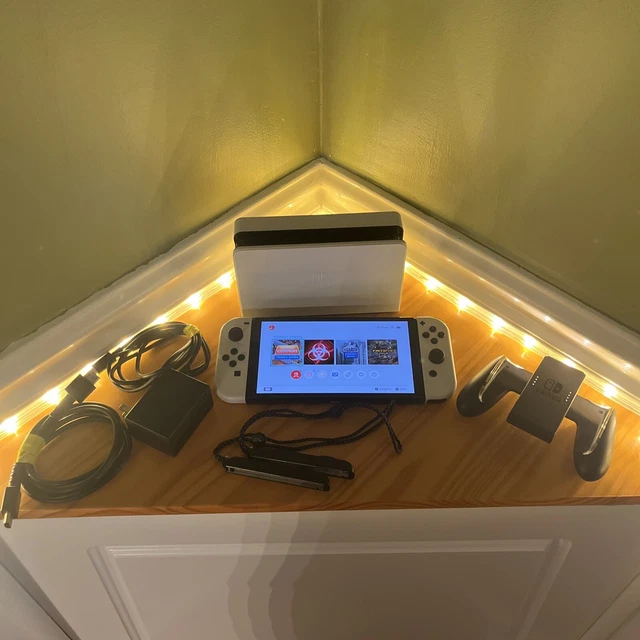 NINTENDO SWITCH OLED + Joycons + Dock With OEM cords + 4 Digital Games