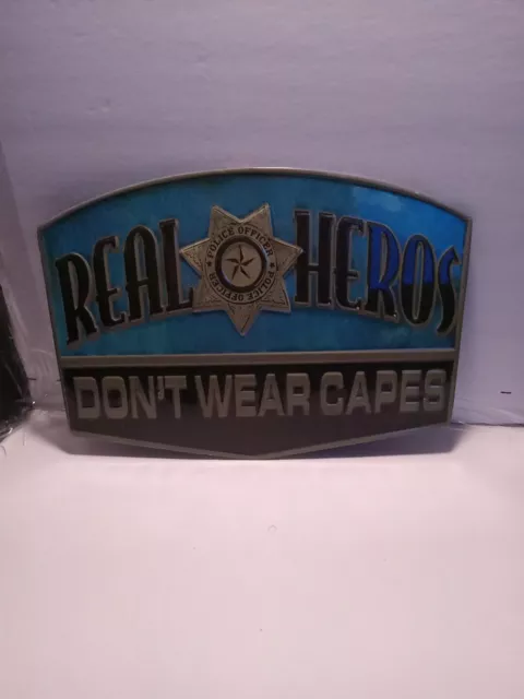 Metal sign Square one brand " Real heroes don't wear capes" Brand New