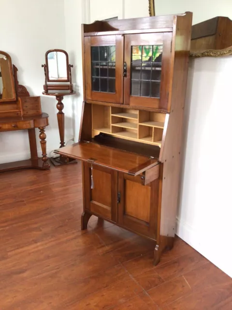 Antique Blackwood drop front  desk with Leadlight doors