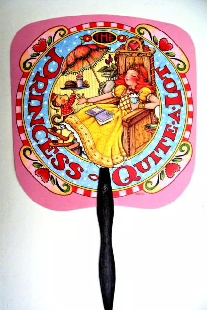 MARY ENGELBREIT QUEEN OF QUITE A LOT PLASTIC HAND FAN COOL GIRL 12" x 7 1/2"