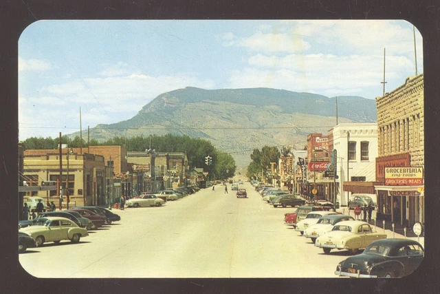 Cody Wyoming Downtown Main Street Scene Old Cars Vintage Postcard