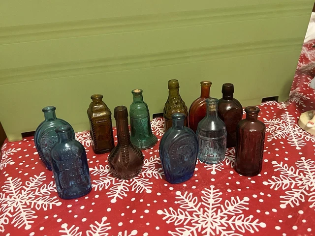 Vintage Lot of 11 Mini Colored Glass Apothecary Bitters Decanter Bottles 3” Tall Vintage Lot of 11 Mini Colored Glass Apothecary Bitters Decanter Bottles 3” Tall