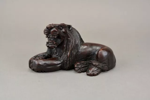 Vintage hand carved figure of a lion ET