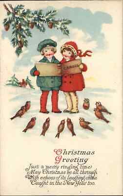 Christmas Children Sing Carols Caroling to Song Birds Vintage Postcard