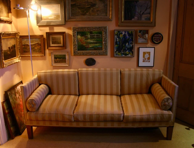Antique Regency Style Campaign Sofa on Mahogany Tapering legs and cushions.
