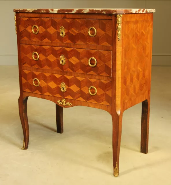 A French 19Th Century Parquetry Chest Of Drawers