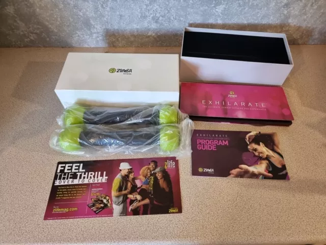 Zumba Fitness Exhilarate Body Shaping System 7 DVDs  + 2 Toning Sticks & guide