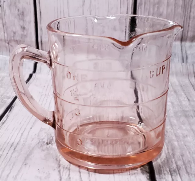 https://www.picclickimg.com/fRMAAOSwJb1lMdPM/Vintage-Kelloggss-Pink-Depression-Glass-Measuring-Cup-Triple.webp