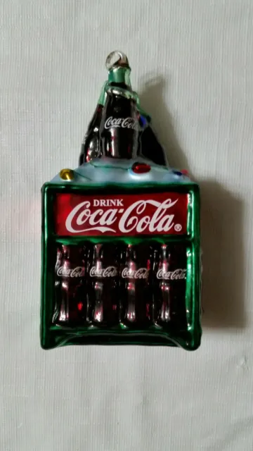 Coca-Cola Mini blown glass ornament in a green pop machine.