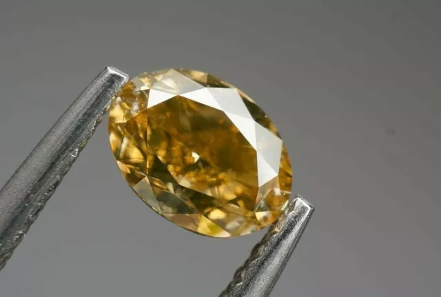 DIAMANTE 0,56 ct , NATURAL FANCY BROWN  VS 2  CERTIFICATO IGI