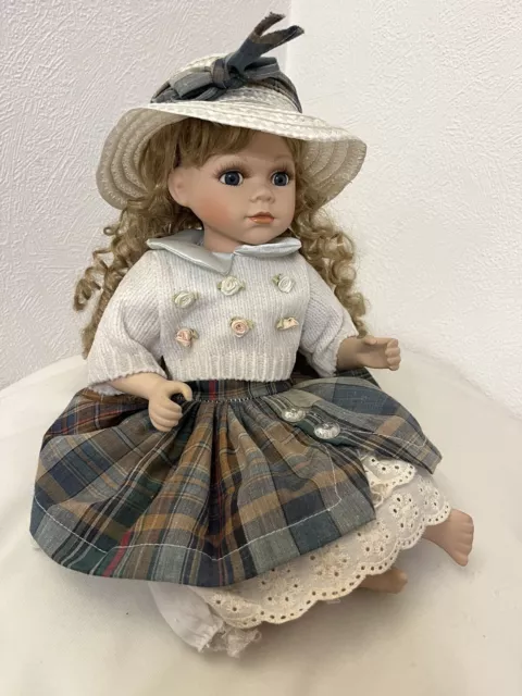 Porcelain Doll In Sitting Position