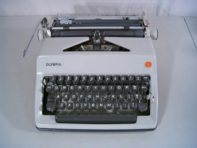 Near Mint 1970 Olympia SM9 Manual Typewriter with Case - Pica Typeface See Video