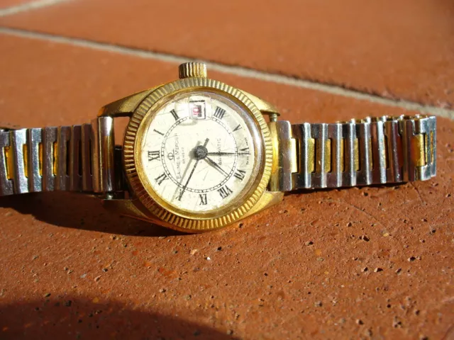 Orologio Baume & Mercier BAUMATIC automatico datario vintage 25mm funzionante.
