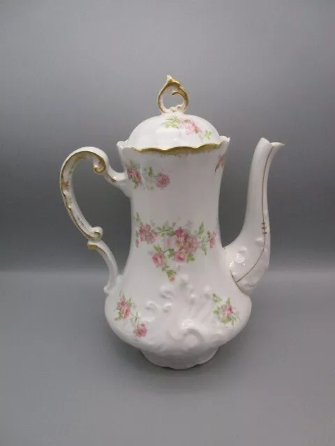 Cafetière ancienne en porcelaine