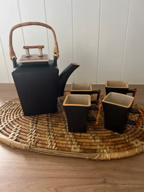 Japanese square teapot with bamboo handles and matching teacups