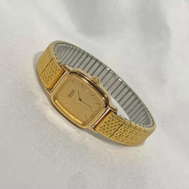 VINTAGE SEIKO CLASSIC Tiny Face Watch 1N00-5K29 Stretch Band Gold Tone ...