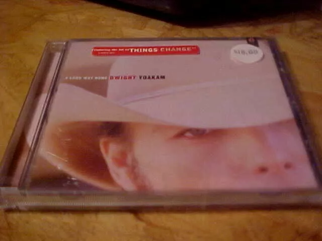 Yoakam, Dwight: A Long Way Home SHRINK TORE OFF BUT NEVER OPENED OR PLAYED