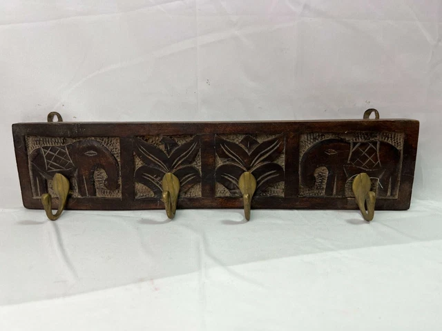 Wooden Cloth or key hanger. Hand Carved with 4 Stylish metal hooks.