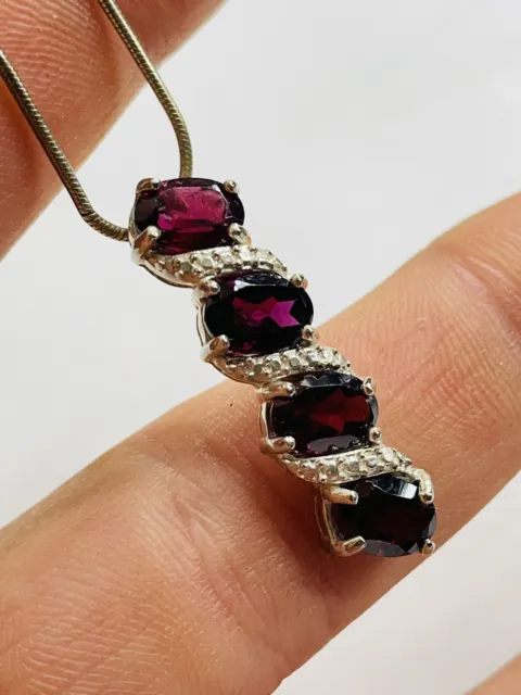 Silver and garnets pendant with 16 inches chain