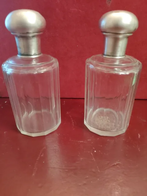 Coppia di Flaconi in cristallo molato e argento 800   h. Cm. 14 porta profumo