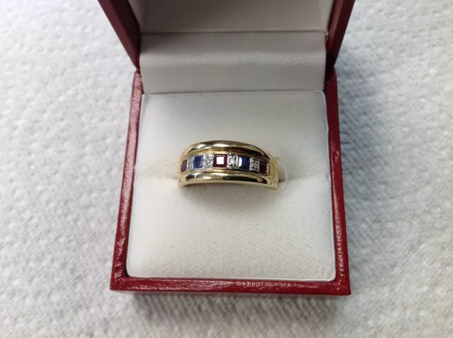 14k yellow gold band ring with sapphire, rubies and diamonds