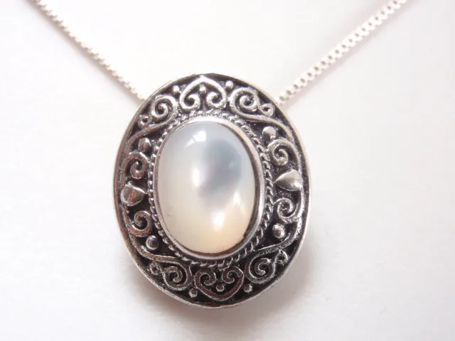 Genuine Mother of Pearl 925 Sterling Silver Swirl Accents Oval Pendant