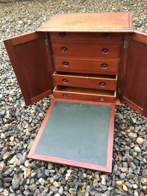 An Edwardian Writing Cabinet / Multi Drawer Cabinet