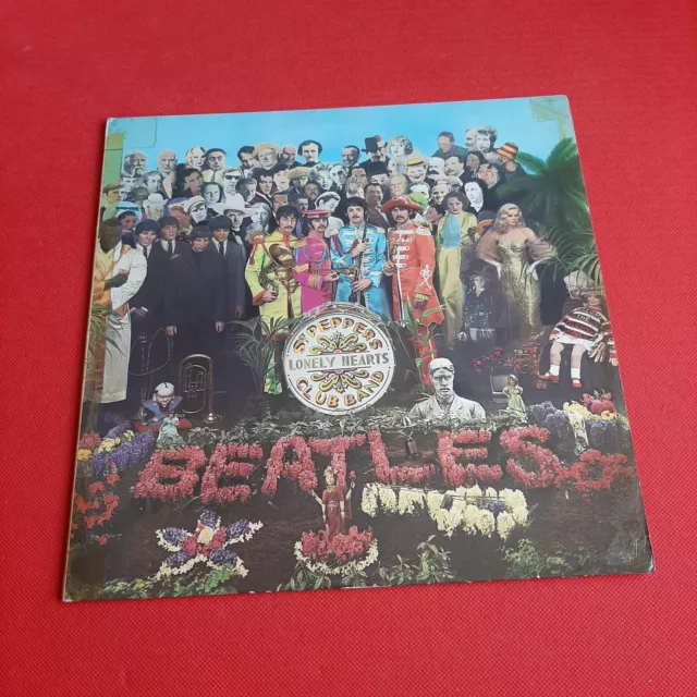 The Beatles - (Sgt Peppers Lonely Hearts Club Band) 1975 VG+ Cut Out Vinyl LP