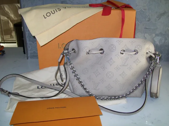 Louis Vuitton Why Knot MM Galet Mahina Silver Hardware – Madison Avenue  Couture