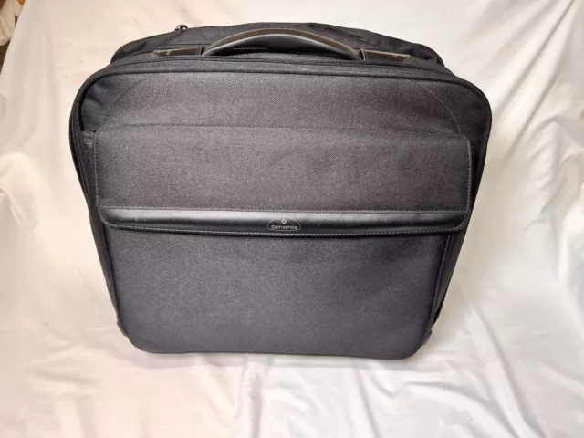 Samsonite Black Rolling Carry on Small Luggage Bag.  17” Wide 13” Tall Computer