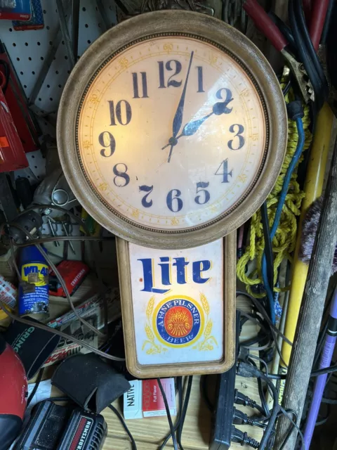 beer clock millers keeps time and lights up good shape vintage clock