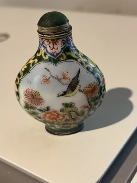 Cloisonne'? Enamel? Snuff Bottle w/images of birds and insects in a garden.