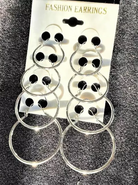 Ladies 4 pair lot of Graduated Hoop Earrings  Silvertone Small to Very Large NEW