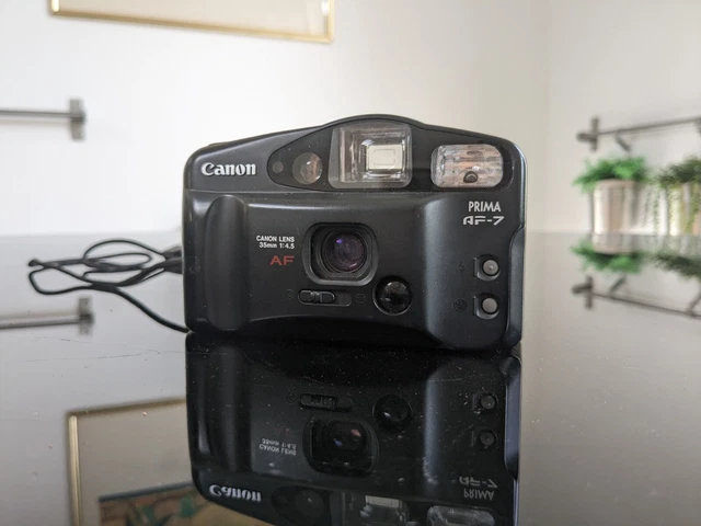 Appareil Photo Vintage Canon Prima AF-10 - Format 35mm, Argenté - Occasion Fonctionnel