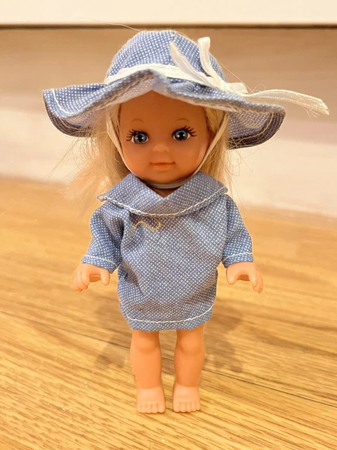Young girl Simba barbie doll ~ blonde hair ~ blue eyes vintage with hat/top