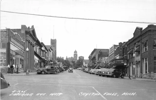 J10/ Crystal Falls Michigan RPPC Postcard c1940s Superior Ave Stores 73