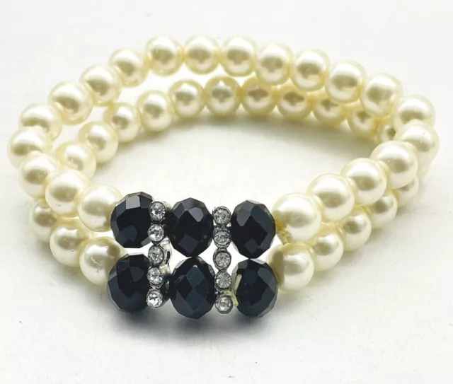 Double Strand Faux Pearl and Black Faceted Bead Stretch Bracelet Silver Tone